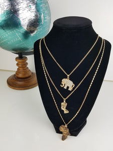 Multi-Layered Gold-Plated Necklace; Elephant, African Royalty, and Africa Map Pendant