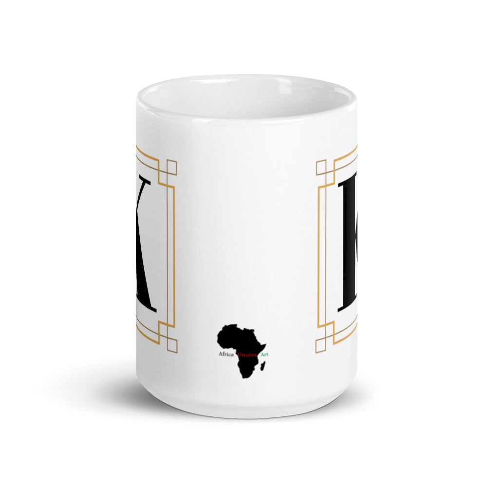 White Framed "K" Monogram Mug by Africa Creates Art