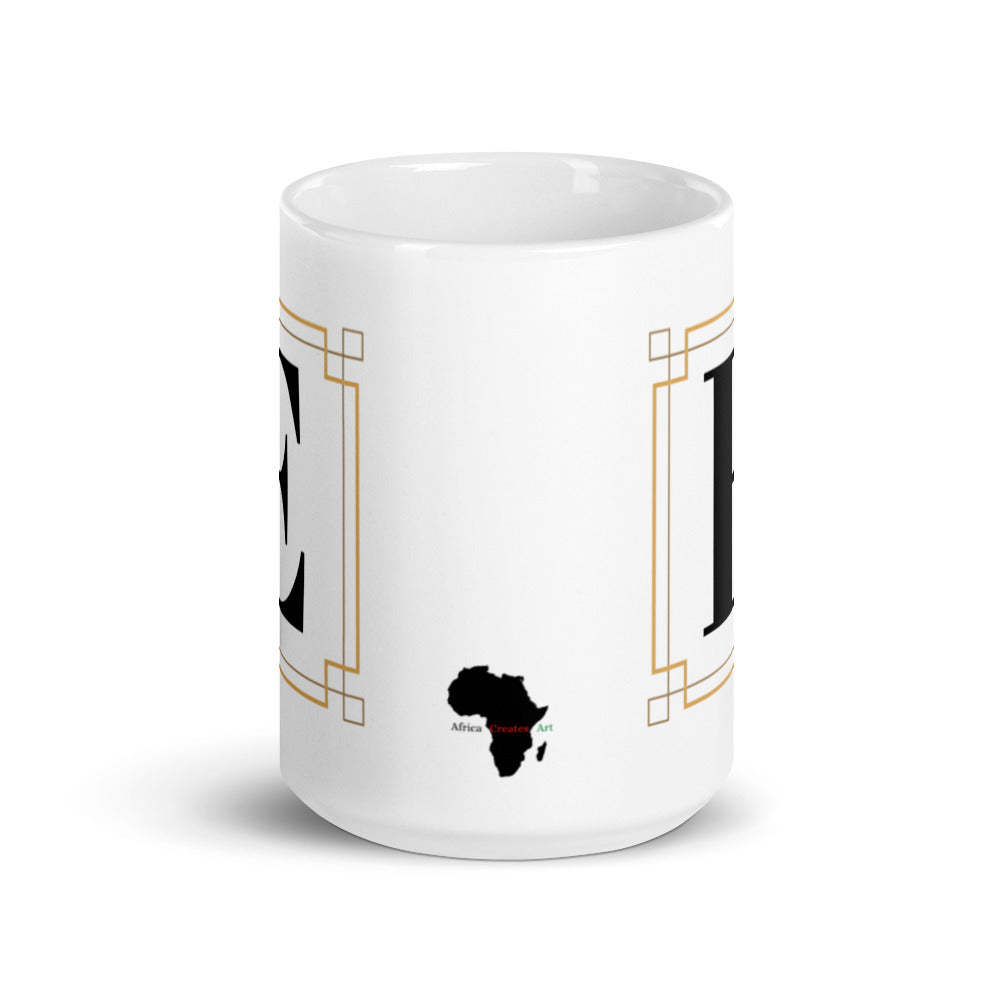 White Framed "E" Monogram Mug by Africa Creates Art