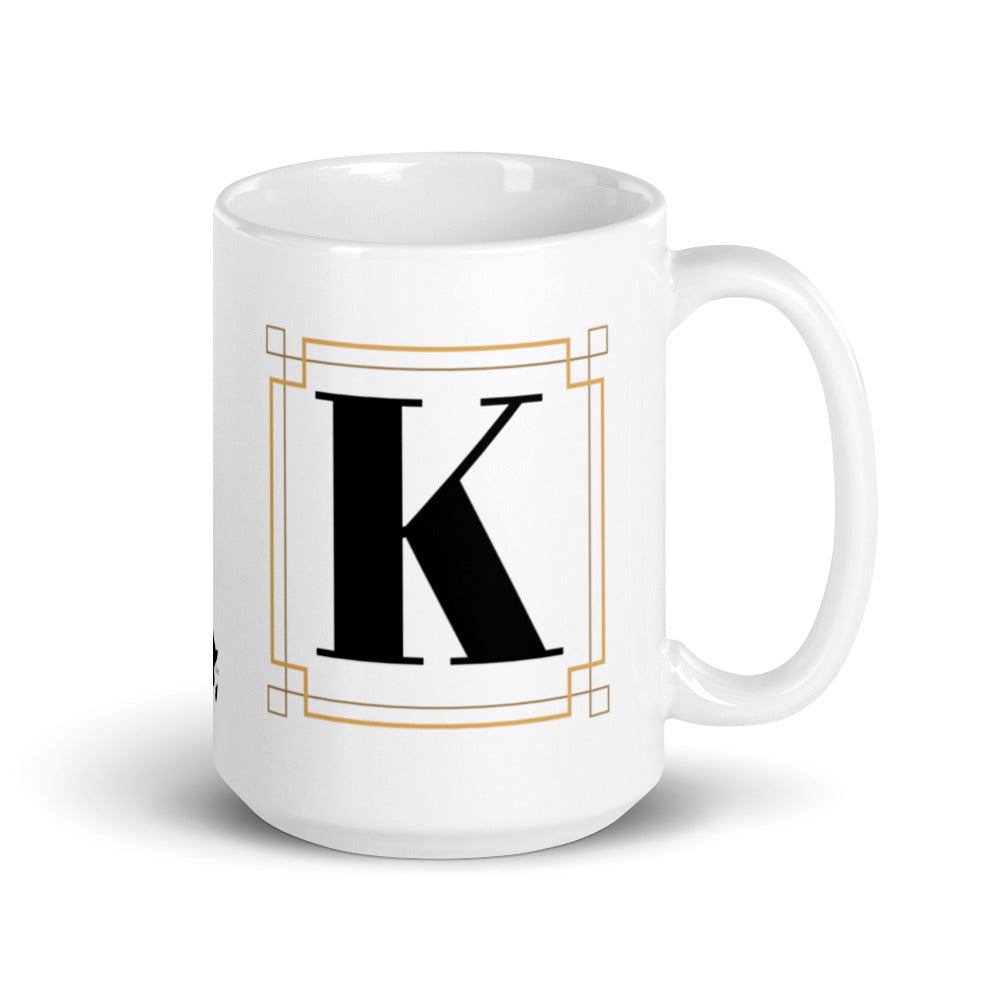 White Framed "K" Monogram Mug by Africa Creates Art