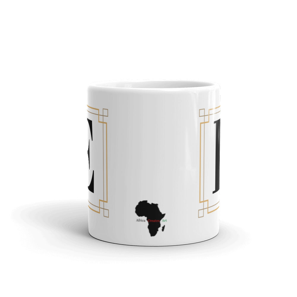 White Framed "E" Monogram Mug by Africa Creates Art