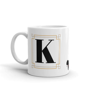 White Framed "K" Monogram Mug by Africa Creates Art