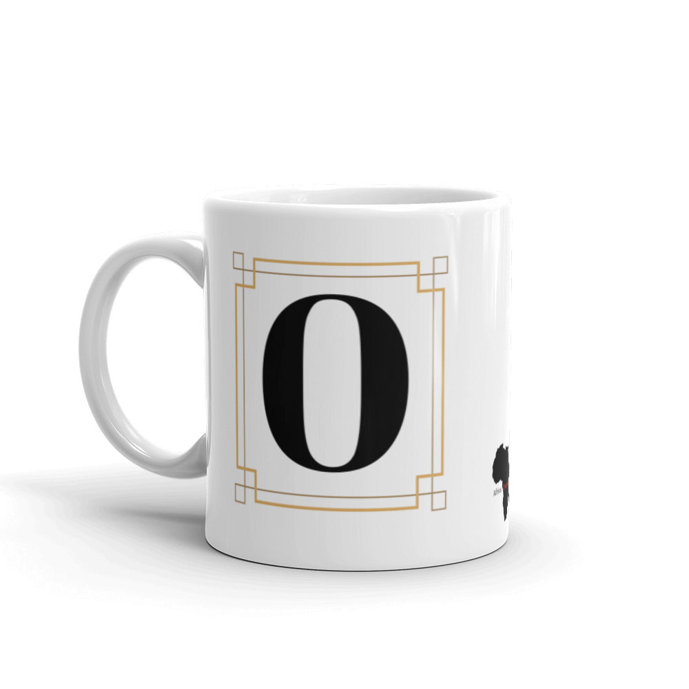 White Framed "O" Monogram Mug by Africa Creates Art