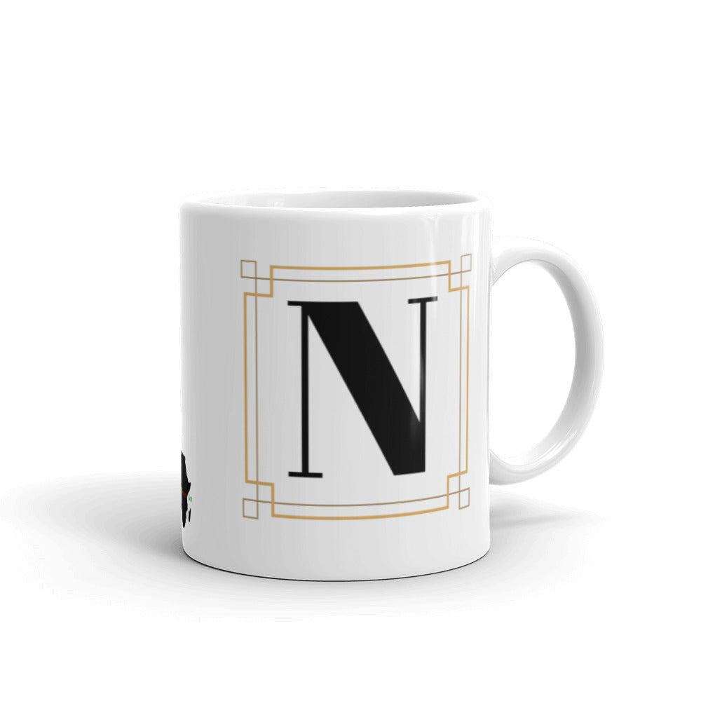 White Framed "N" Monogram Mug by Africa Creates Art