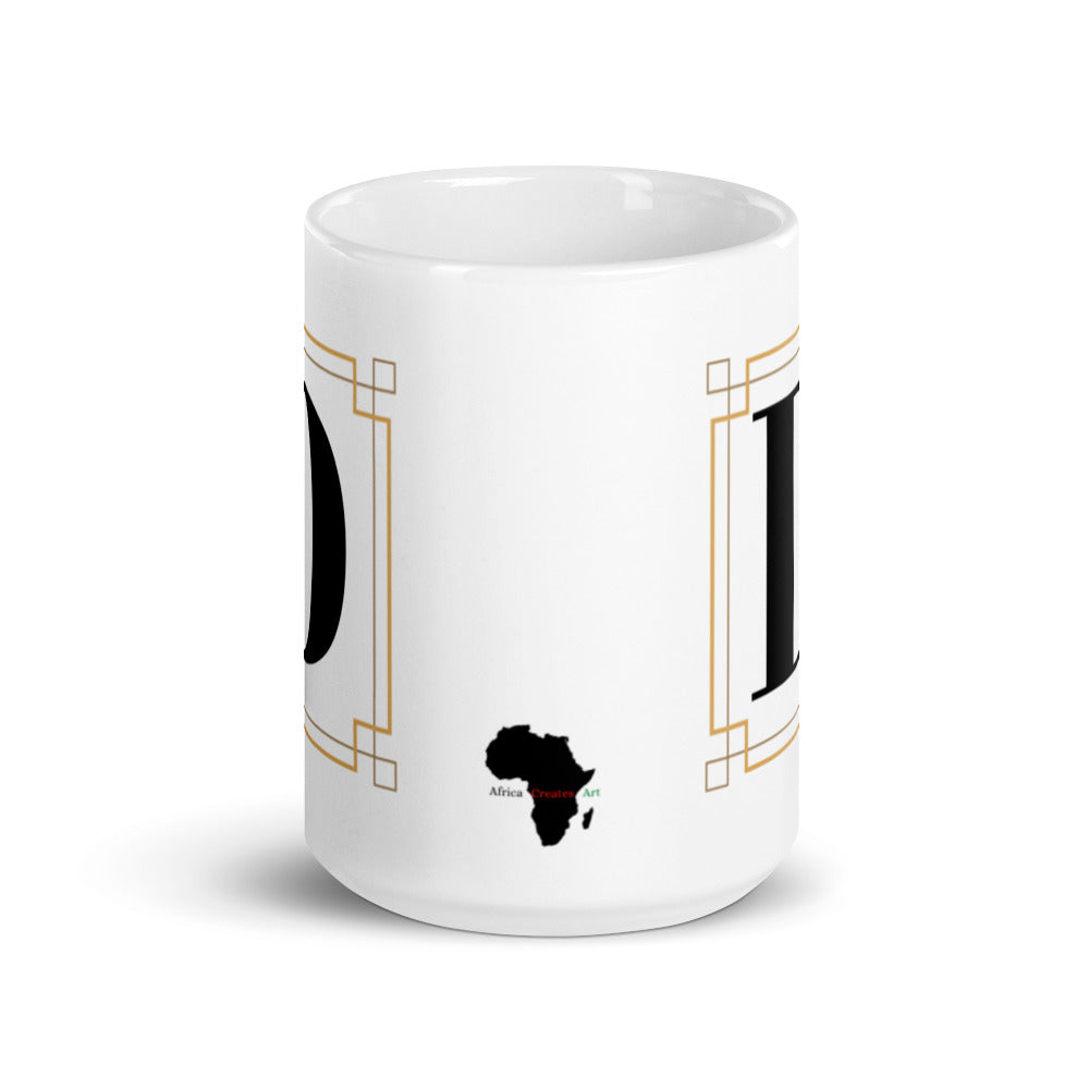 White Framed "D" Monogram Mug by Africa Creates Art