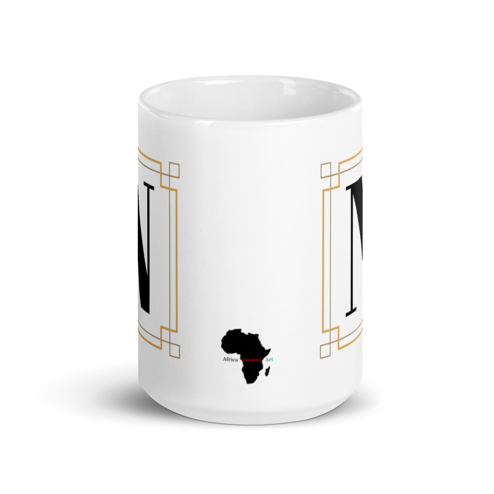 White Framed "N" Monogram Mug by Africa Creates Art