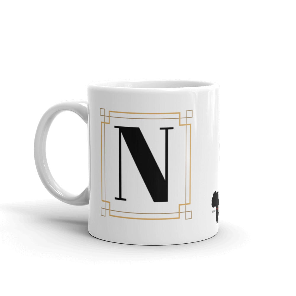 White Framed "N" Monogram Mug by Africa Creates Art