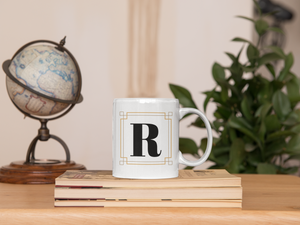 White Framed "R" Monogram Mug by Africa Creates Art